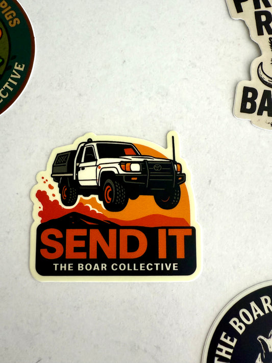 Send It sticker featuring a 4WD LandCruiser jumping over hills at sunset by The Boar Collective